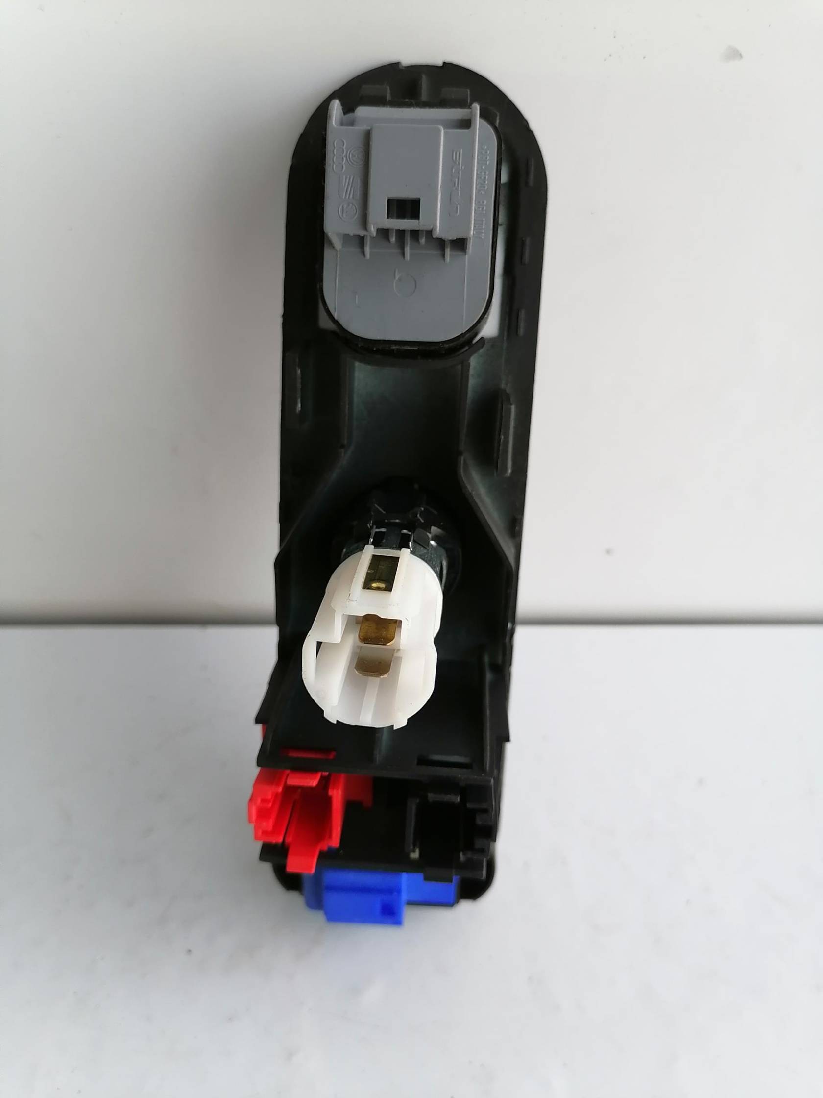 Interruttore regolazione retrovisore est.